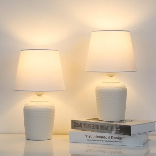 Two small table lamps with rivet textured base