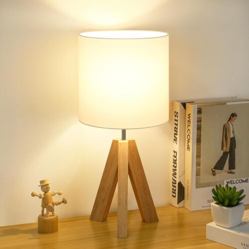 Small wooden tripod table lamp with white fabric shade